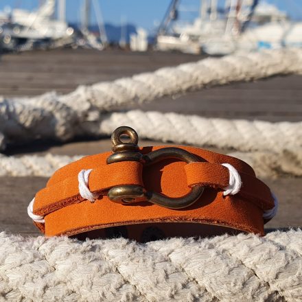 Leather bracelet The ‘Poniente’ with a brass mini shekel combained with leather – orange